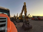 Used Excavator in yard,Back of used Excavator,Side of used Excavator under setting sky,Front of used Excavator